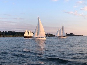 Crowded sunset sail